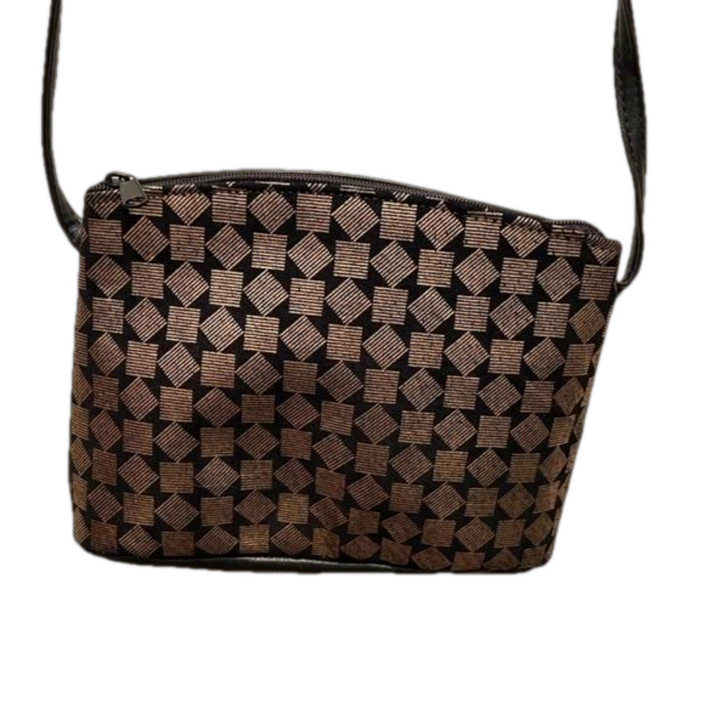 Vintage gold and black leather crossbody bag. 8x5 with 24in strap.‎